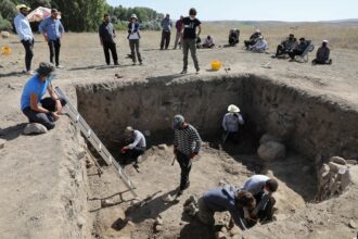 Archaeologists work on the remains of a Hittite palace and its luxurious ceramics and glassware, which were discovered at the Usakli Hoyuk excavation site, near Yozgat in Turkey on Sept. 21, 2021. Credit: Adem Altan/AFP via Getty Images